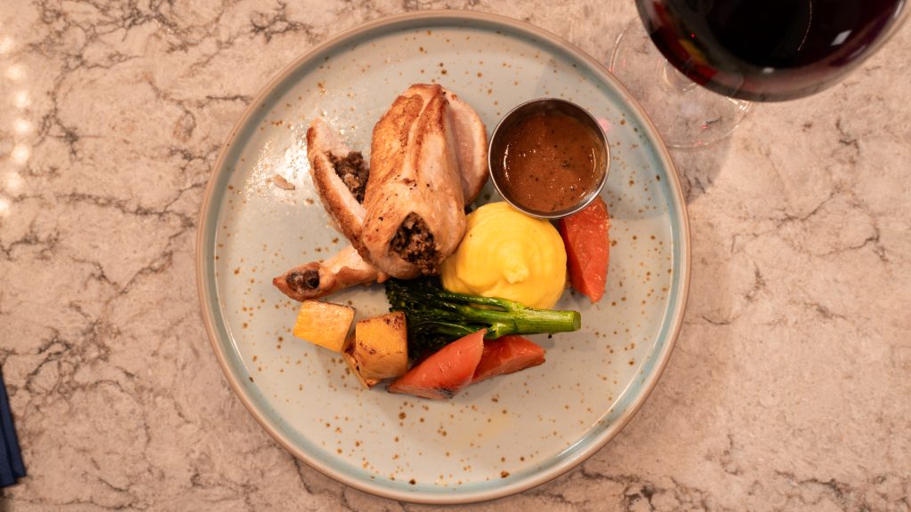 Places to Eat Near Glasgow's Big Venues: Scotstoun, Hampden, the Hydro and More 11 A chicken breast stuffed with haggis, with mash, vegetables and sauce on a speckled plate